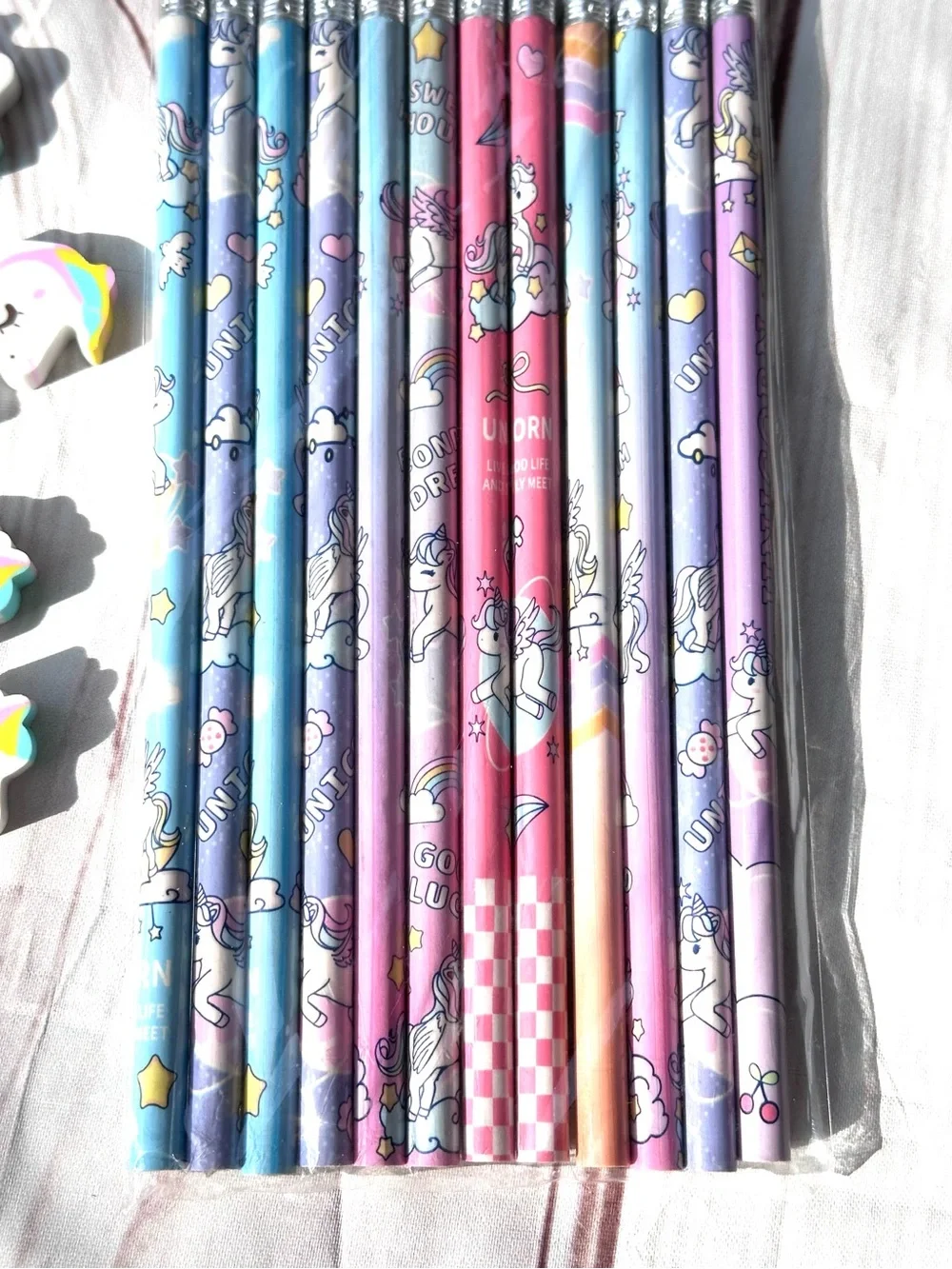 12 Rainbow Unicorn Pencil Set with Pastel Designs and Eraser Toppers